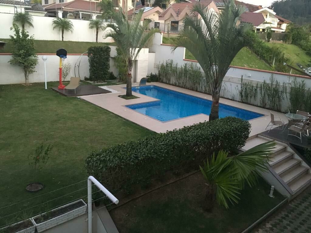 Imagem do Casa com piscina em condomínio Residencial  Fechado no bairro Jaraguá Esquerdo